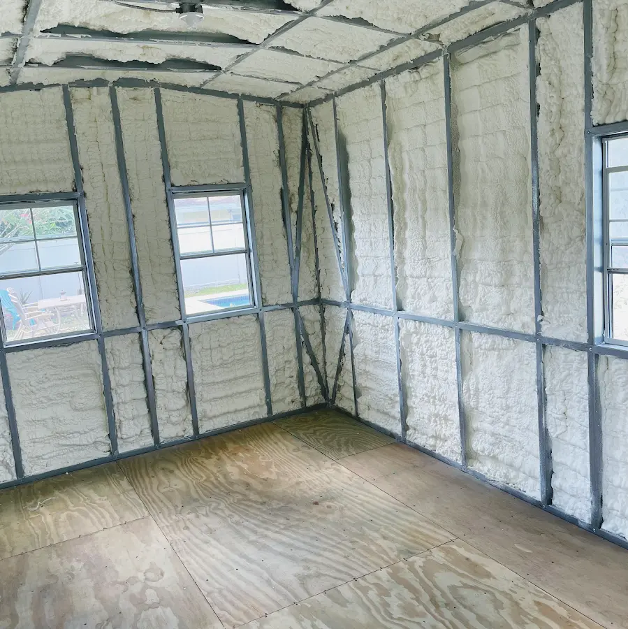 Closed-cell spray foam insulation applied to wall cavities in a residential project in Rancho San Diego